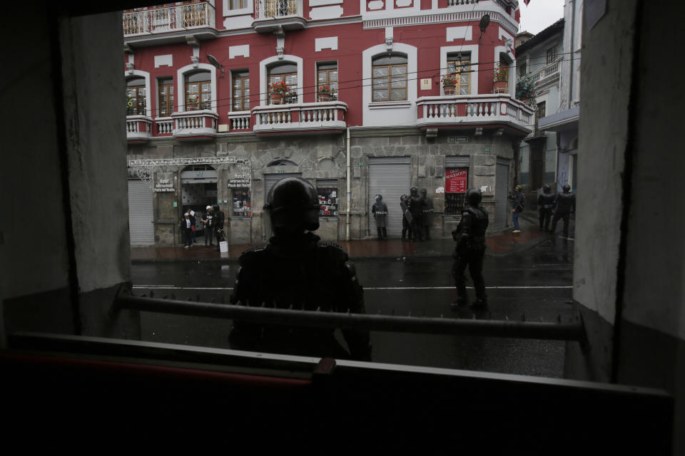 Police patrol during a transportation strike called to protest the president in Quito, Ecuador, Thursday, Oct. 3, 2019. Ecuador’s president has declared a state of emergency to confront rowdy street protests and a nationwide transport strike over his decision to end government fuel subsidies and relax labor protections. (AP Photo/Dolores Ochoa)