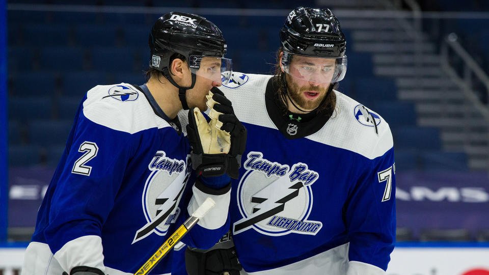 TAMPA, FL - FEBRUARY 5: Jan Rutta #44 and Victor Hedman #77 of the Tampa Bay Lightning skate against the Detroit Red Wings during the second period at Amalie Arena on February 5, 2021 in Tampa, Florida. (Photo by Scott Audette /NHLI via Getty Images)