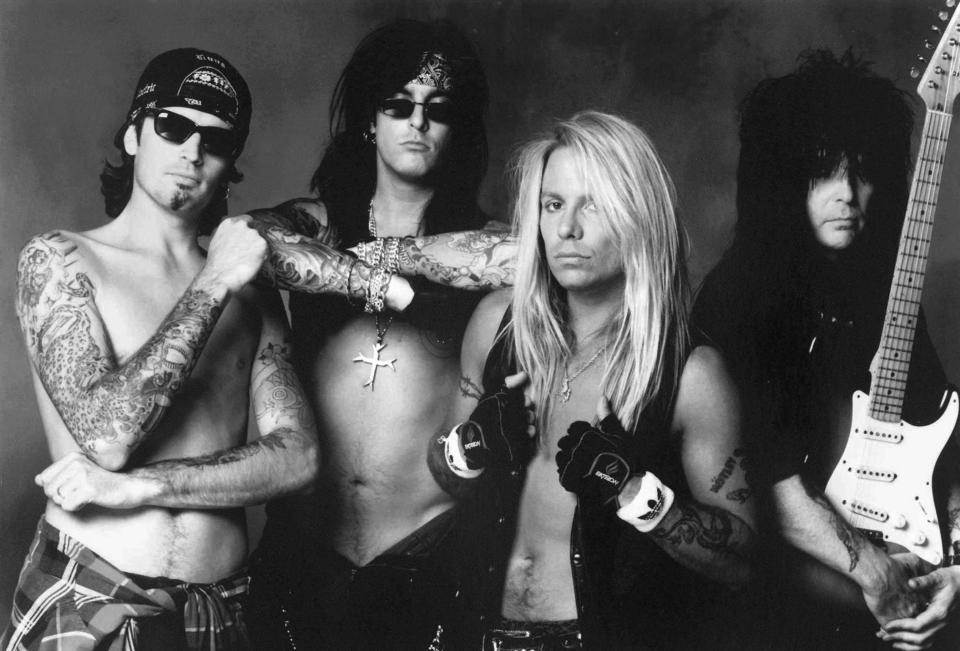 Tommy Lee, left, Nikki Sixx, Vince Neil and Mick Mars of rock group Motley Crue.