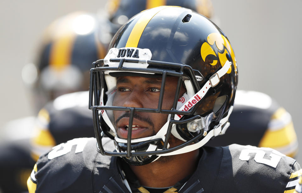 Iowa running back Akrum Wadley walks onto the field before an NCAA college football game against North Texas, Saturday, Sept. 16, 2017, in Iowa City, Iowa. (AP Photo/Charlie Neibergall)