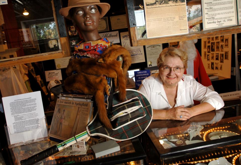 Rita Reagan, then-president of the Springfield Heritage Education Center, is shown in July 2007 with some of the preservation organization’s collection, including a tennis racket belonging to professional tennis player Leslie Allen who owned property in Springfield. Reagan, a champion of preservation in Jacksonville, died Wednesday, Aug. 30, 2023, at the age of 83.
