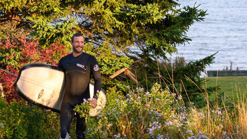 Petty with his surfboard.