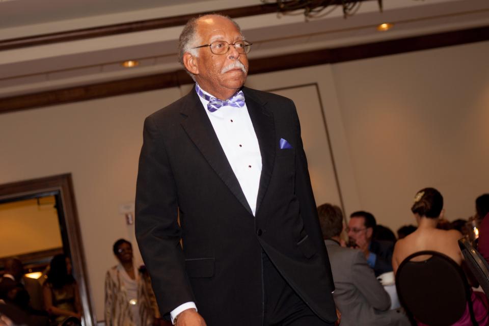 Larry Saunders, senior funeral director for Chestnut Funeral Home where he worked for more than 50 years, has died at age 73. He is pictured here walking the Red Carpet during the the Chestnut Funeral Home Centennial Gala at the Best Western Gateway Grand Hotel on June 22, 2014, in Gainesville.