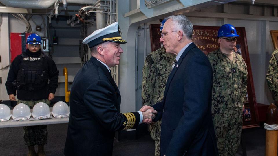 Nickolas Guertin, right, Assistant Secretary of the Navy (Research, Development and Acquisition), shakes hands with Capt. Daryle Cardone, commanding officer of aircraft carrier USS Ronald Reagan (CVN 76), on the ceremonial quarterdeck prior to a ship tour while in port in Yokosuka, Japan, on Jan. 19, 2024.  (MC3 Jonathan EstradaEguizabal/US Navy)