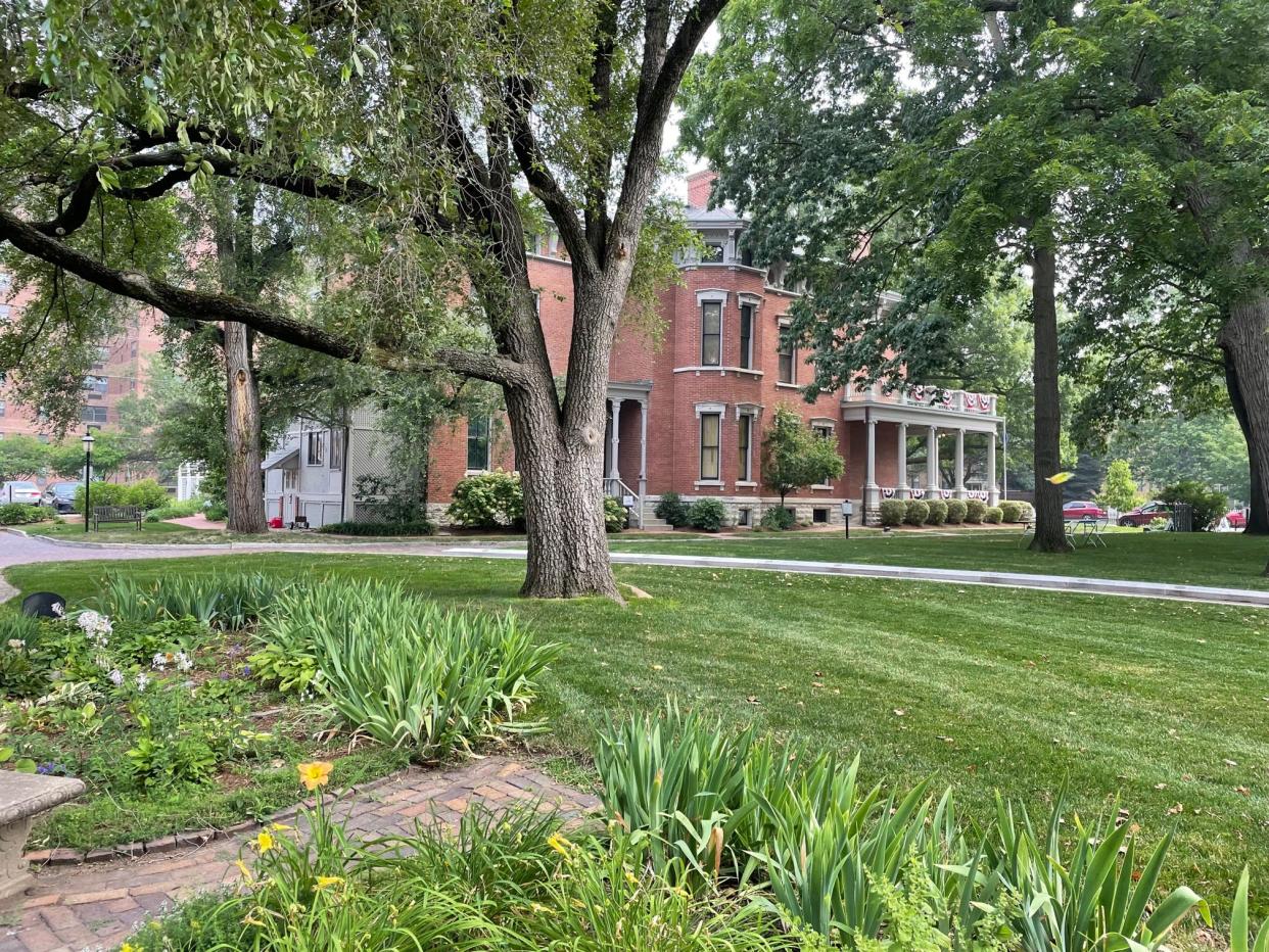 The lovely grounds surrounding the Harrison House include gardens, verdant pathways and a plaza for public events.