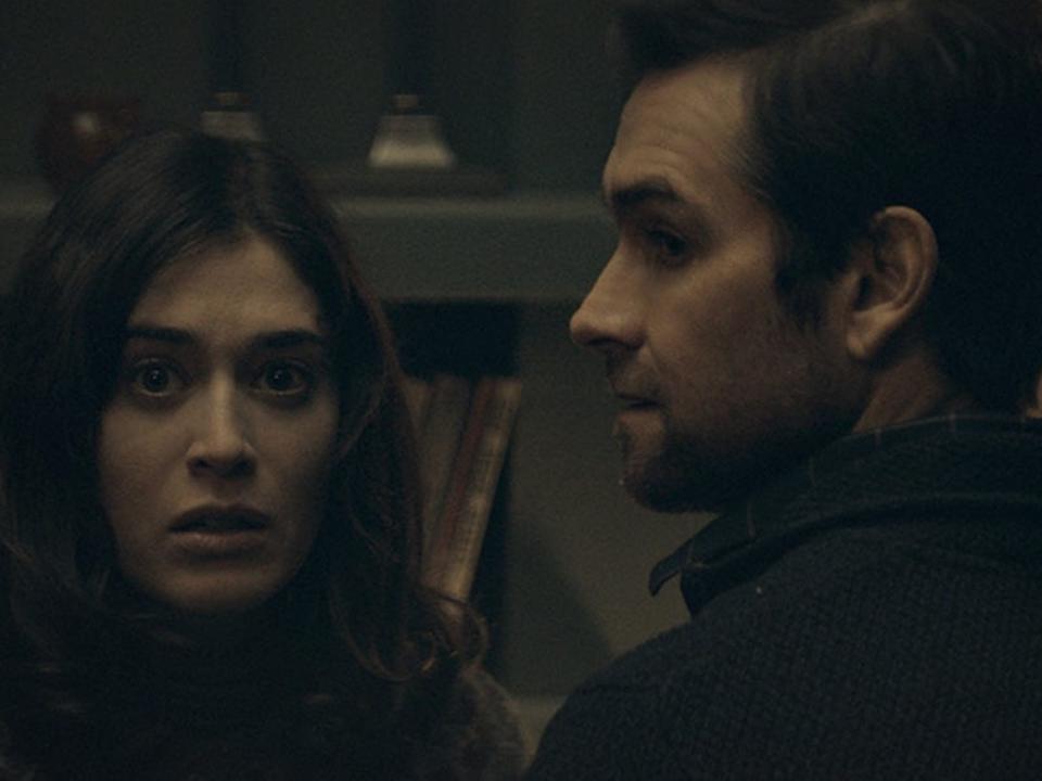 Lizzy Caplan as Carol and Antony Starr as Mark in "Cobweb."