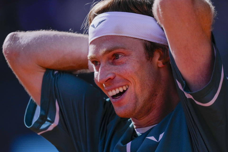 Andrey Rublev, of Russia, reacts during a match against Taylor Fritz, of United States, at the Mutua Madrid Open tennis tournament in Madrid, Spain, Friday, May 3, 2024. (AP Photo/Bernat Armangue)