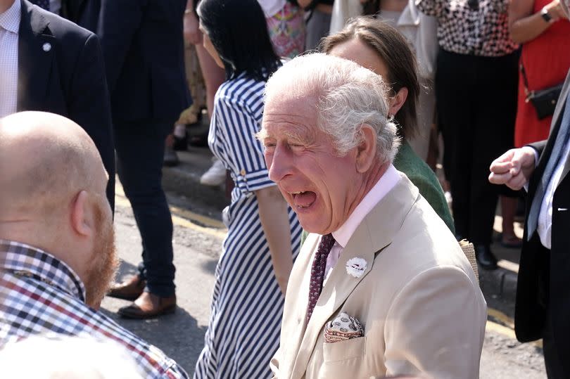 File image: King Charles III laughs with a well wisher during a visit to Pickering in Yorkshire, after arriving by royal train, pulled by the Flying Scotsman. Picture date: Monday June 12, 2023. PA Photo. See PA story ROYAL King. Photo credit should read: Owen Humphreys/PA Wire