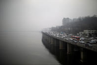 Vehicles move on a road on a polluted day in Seoul, South Korea, March 12, 2019. REUTERS/Kim Hong-ji