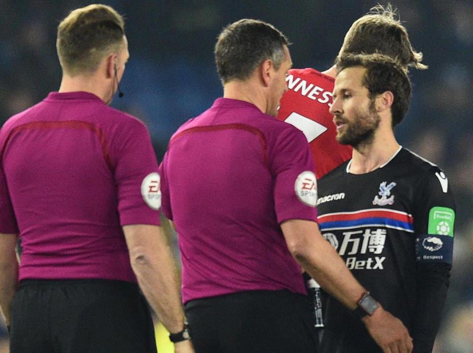 Crystal Palace's players weren't happy with Marriner's decision (AFP)