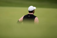Tiger Woods waits play on the 18th hole during the third round of the PGA Championship golf tournament at Southern Hills Country Club, Saturday, May 21, 2022, in Tulsa, Okla. (AP Photo/Eric Gay)