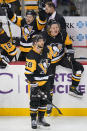 Pittsburgh Penguins' Kris Letang (58) listens as his overtime goal is announced after review, during the team's NHL hockey game against the Philadelphia Flyers in Pittsburgh, Thursday, Nov. 4, 2021. The Penguins won 3-2. (AP Photo/Gene J. Puskar)