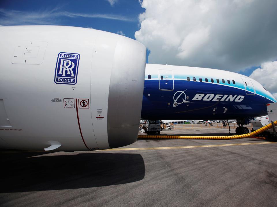 FILE PHOTO: A view of one of two Rolls Royce Trent 1000 engines of the Boeing 787 Dreamliner during a media tour of the aircraft ahead of the Singapore Airshow in Singapore February 12, 2012.   REUTERS/Edgar Su/File Photo