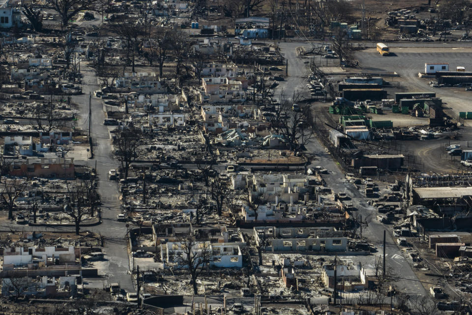 FILE - A general view shows the aftermath of a wildfire in Lahaina, Hawaii, Thursday, Aug. 17, 2023. Hope is hard to let go of as odds wane over reuniting with still-missing loved ones after a fire swept across the town of Lahaina on Hawaii's Maui island earlier this month. (AP Photo/Jae C. Hong, File)