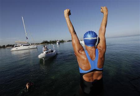 U.S. long-distance swimmer Diana Nyad cheers before attempting to swim to Florida from Havana