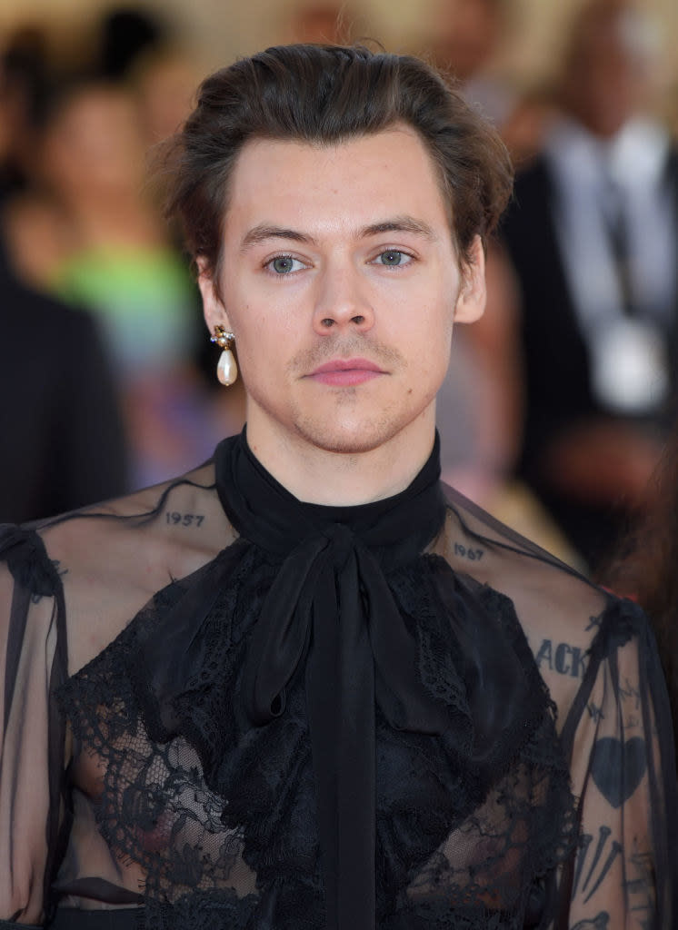 Close-up of Harry with one earring