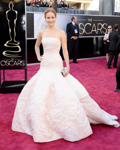 <p>Jason Merritt/Getty</p> Jennifer Lawrence at the 2013 Oscars