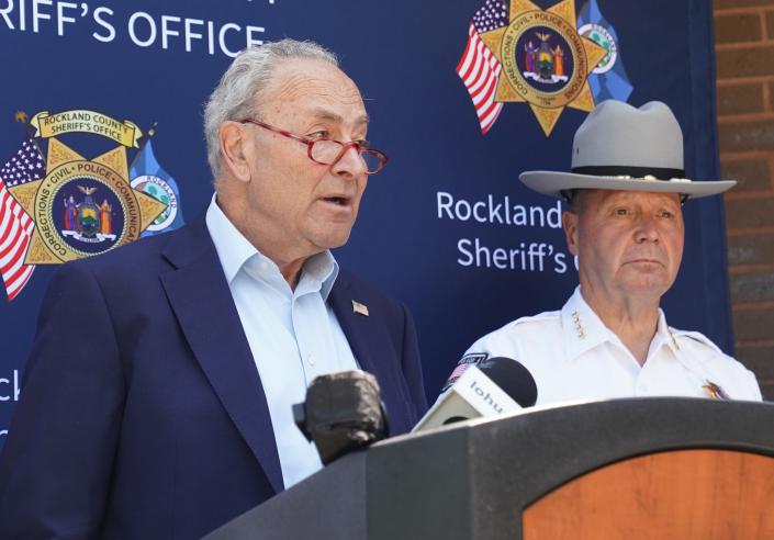 Senator Charles E. Schumer, left, with Putnam Co. Sheriff Kevin McConville, speaks at the Rockland Co. Sheriff's office in New City. Wednesday, July 5, 2023.Surrounded by local law enforcement from across the Hudson Valley, Senator Charles E. Schumer reveals how years of bureaucratic delays have put millions in critical funding they are owed from the Federal Government for work officers did as a part of Westchester's DEA task force. 