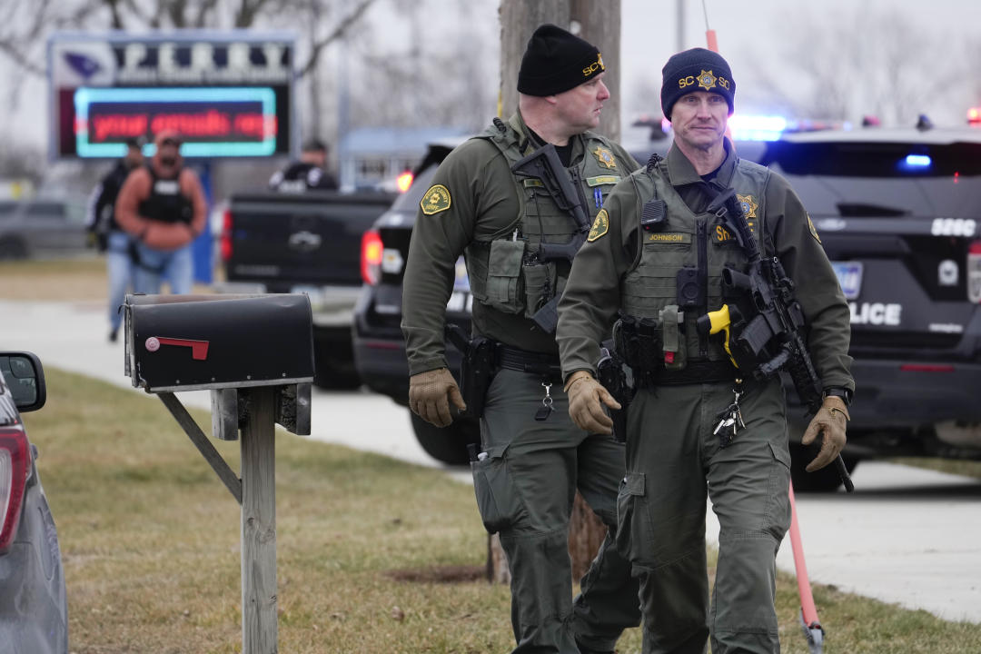 Two police officers in Perry, Iowa.