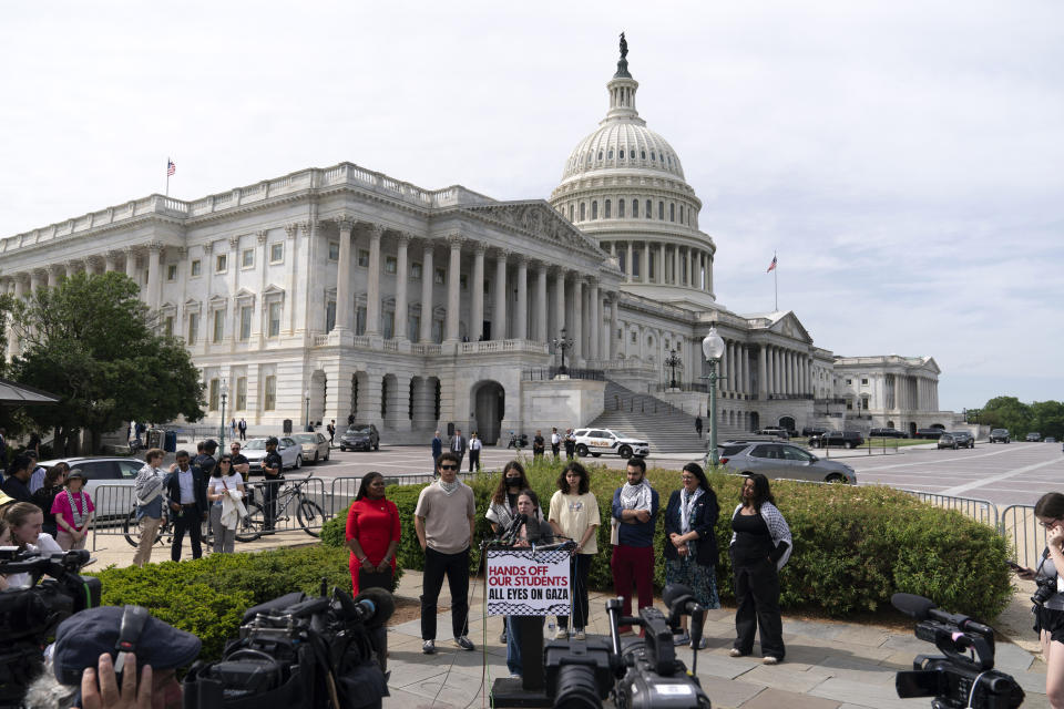 George Washington University student Miriam who was arrested this morning at the encampament accompanied by Rep. Cori Bush, D-Mo., and Rep. Rashida Tlaib, D-Mich., speaks during a news conference at the U.S. Capitol, Wednesday, May 8, 2024, in Washington, after police cleared a pro-Palestinian tent encampment at George Washington University early Wednesday and arrested demonstrators. (AP Photo/Jose Luis Magana)