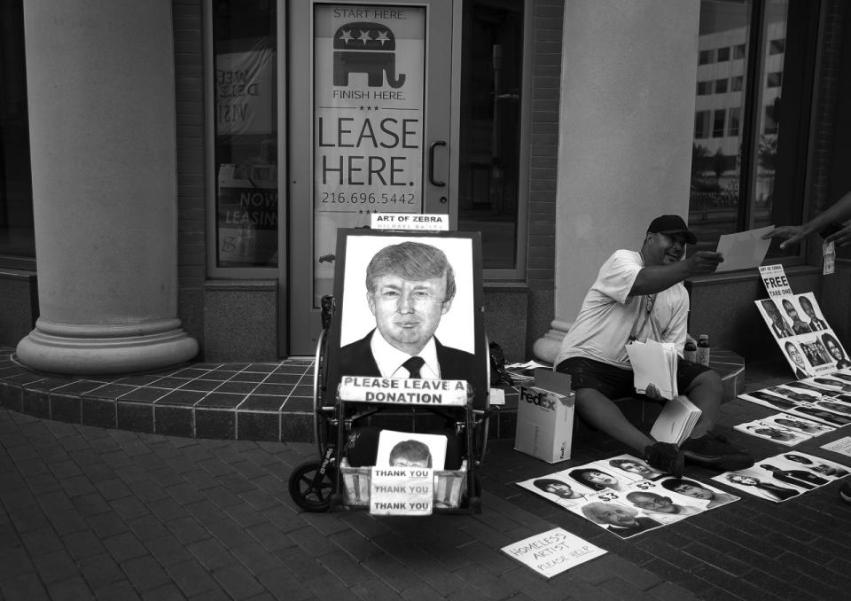 <p>A vendor sells hand-drawn images of Trump and other celebrities in Cleveland. (Photo: Khue Bui for Yahoo News)</p>