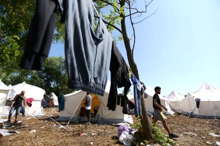 Migrants are seen in the migrant camp Vucjak in Bihac area