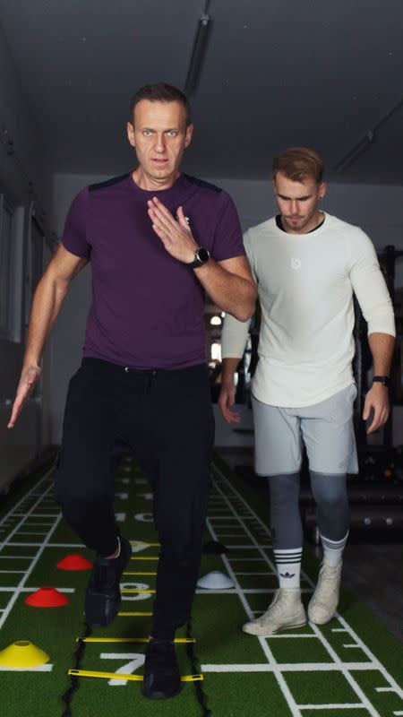 Russian opposition activist Navalny and his personal trainer Leber are seen at the AlbGym fitness studio in St. Blasien