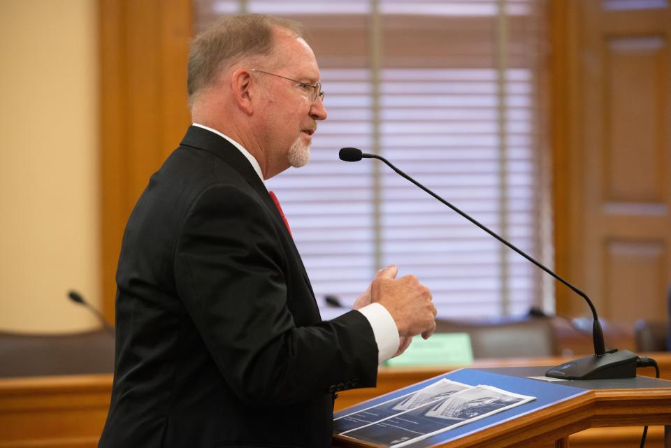 Ron Hulshizer, managing director of BKD Cyber, takes questions from the podium during a KDOL audit committee meeting Tuesday at the Statehouse.