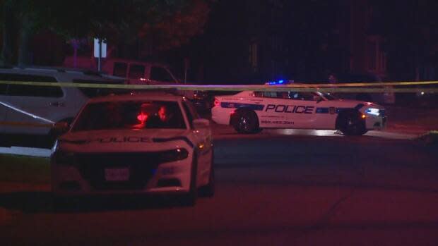 Emergency crews outside of the homicide victim's house in Brampton on August 13, 2020. (CBC - image credit)