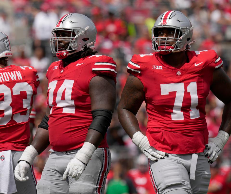 Sept. 9, 2023; Columbus, Oh., USA;  Ohio State Buckeyes offensive lineman Donovan Jackson (74) and Ohio State Buckeyes offensive lineman Josh Simmons (71) play during the first half of Saturday's NCAA Division I football game at Ohio Stadium. 