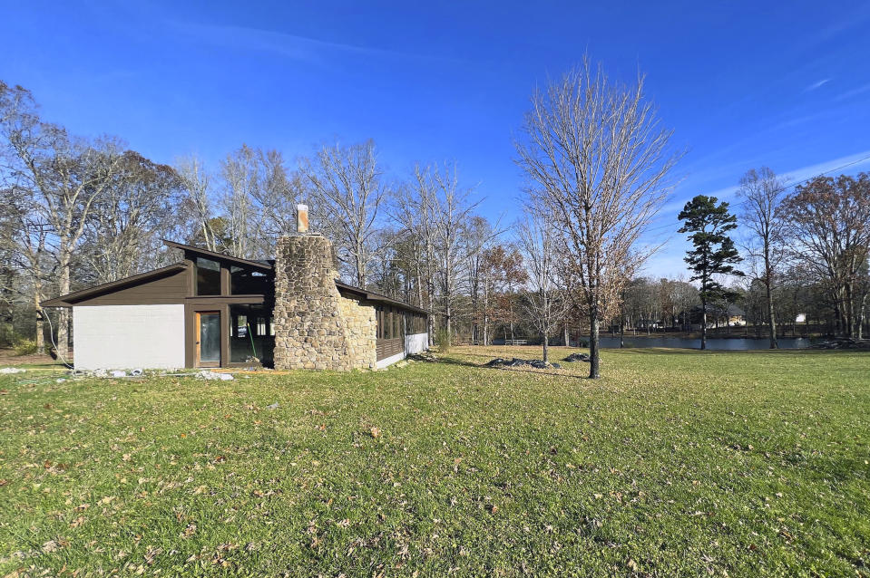 This 2021 photo shows library building of Highlander Folk School in New Market, Tenn. A fight is brewing in Tennessee over the legacy of a legendary social justice school that counts Rosa Parks among its alumni and Eleanor Roosevelt among its supporters. One of the few buildings left is the Highlander library. Preservationists restored the building and want it listed on the National Register of Historic Places. But the Highlander Research and Education Center never stopped working from a new location.(David Currey via AP)