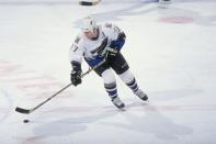 11 Mar 1999: Adam Oates #77 of the Washington Capitals skates down the ice during the game against the Florida Panthers at the MCI Center in Washington, D.C. The Panthers defeated the Capitals 2-1. Mandatory Credit: Doug Pensinger /Allsport