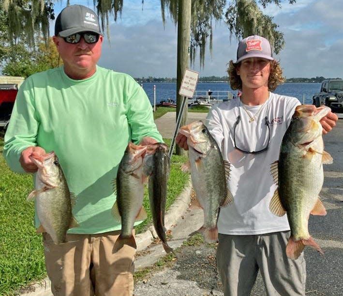 Chris Ready, left, and Andrew Ready had 16.70 pounds and also had big bass with a 5.14-pounder to win first place during the Wednesday Open Bass Series tournament on Nov. 23 on the Winter Haven North Chain.