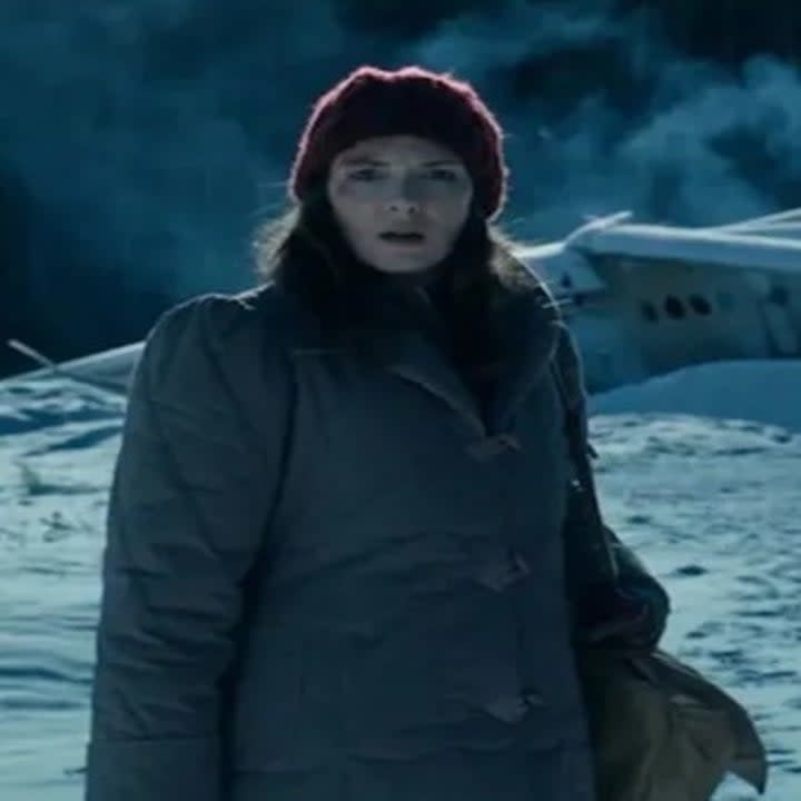 Joyce Byers standing in a winter coat in Stranger Things Season 4