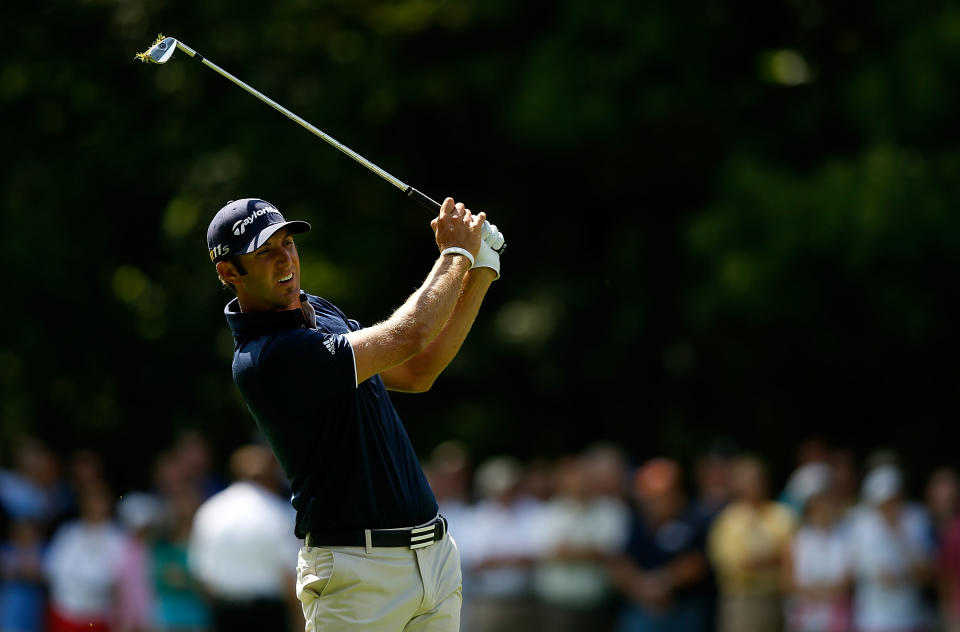 CARMEL, IN - SEPTEMBER 09: Dustin Johnson watches his approach shot on the first hole during the final round of the BMW Championship at Crooked Stick Golf Club on September 9, 2012 in Carmel, Indiana. (Photo by Scott Halleran/Getty Images)