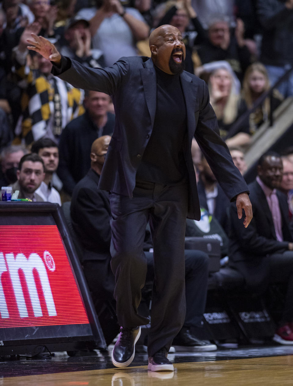 Indiana head coach Mike Woodson reacts to action on the court during the first half of an NCAA college basketball game against Purdue, Saturday, March 5, 2022, in West Lafayette, Ind. (AP Photo/Doug McSchooler)