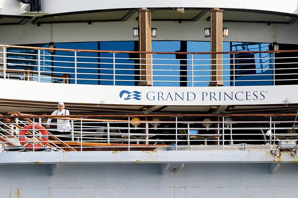 9 Passengers look out from balconies aboard the Grand Princess as it cruises a holding pattern about 25 miles off the coast of San Francisco on Sunday, March 8, 2020.