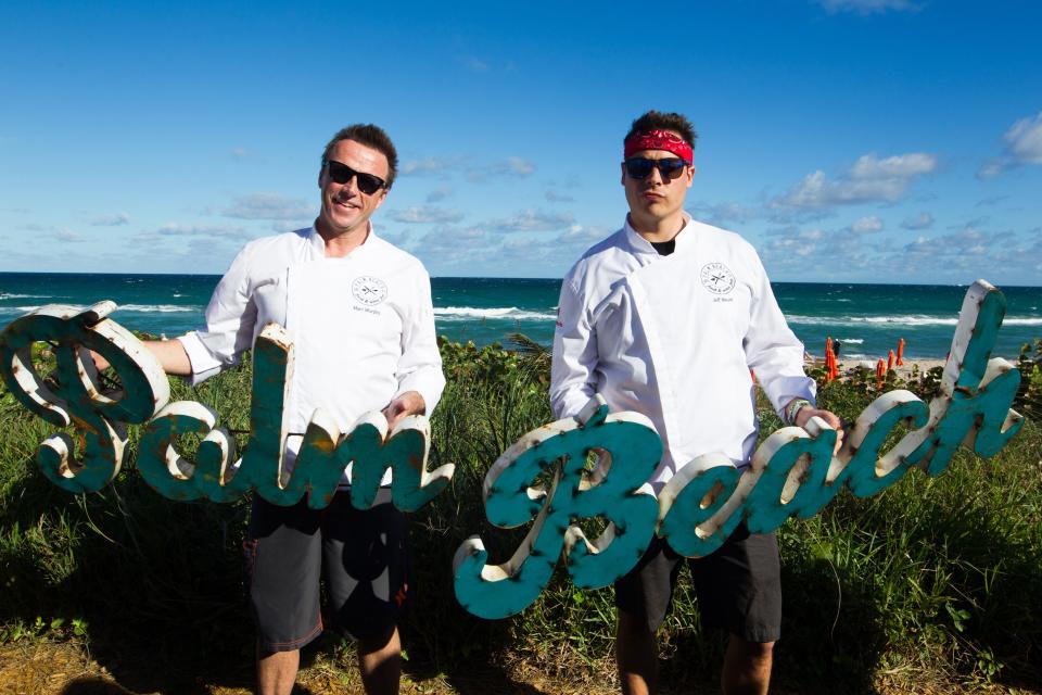 Flashback to 2015: Food Network star chefs Marc Murphy (left) and Jeff Mauro pose seaside during the annual Palm Beach Food and Wine Festival. Murphy returns this year for a lunch event at Meat Market and as a throw-down judge at the fest's Grand Tasting.