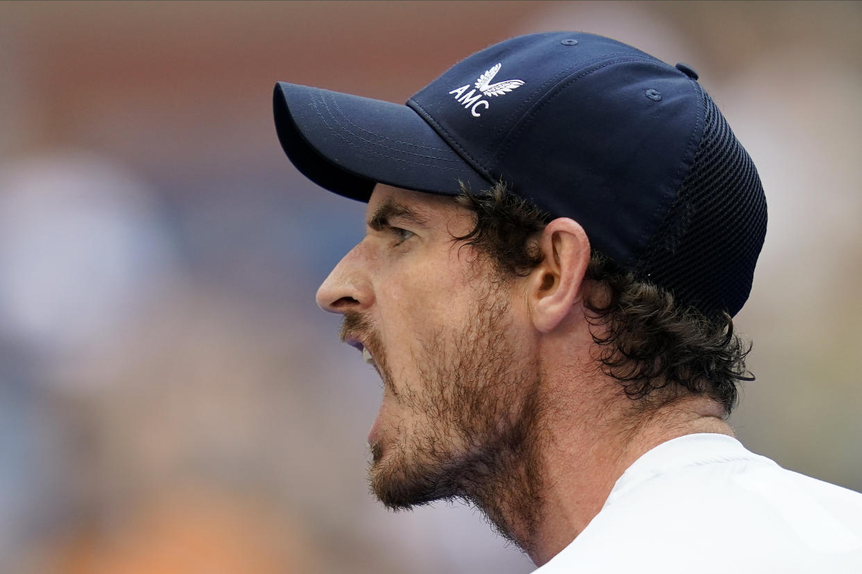 Andy Murray, of Great Britain, reacts during the first round of the US Open tennis championships against Stefanos Tsitsipas, of Greece, Monday, Aug. 30, 2021, in New York. (AP Photo/Seth Wenig)