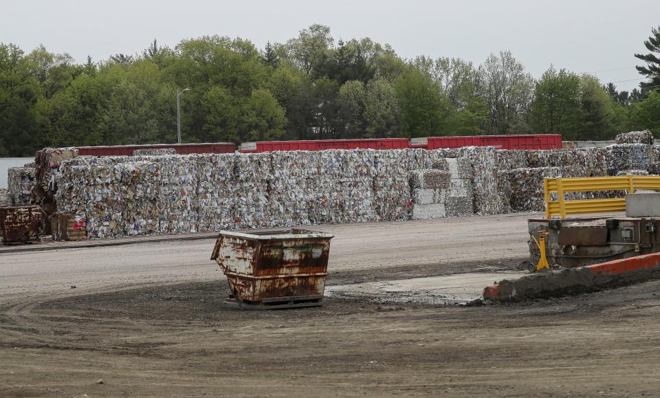 Bales of to-be-recycled cardboard are seen Thursday, May 18, 2023, at the ND Paper mill in Biron, Wis. A new recycling facility gives the Biron mill the ability to process recycled paper material and then use it to produce new paper products.