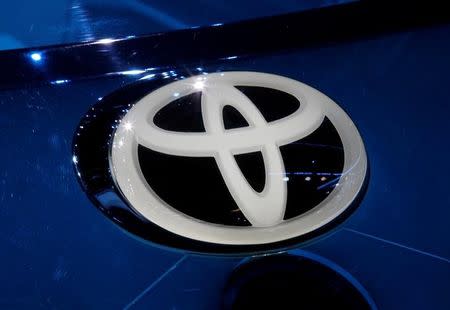 A Toyota logo is seen on media day at the Mondial de l'Automobile, the Paris auto show, in Paris, France, September 29, 2016. REUTERS/Jacky Naegelen/Files