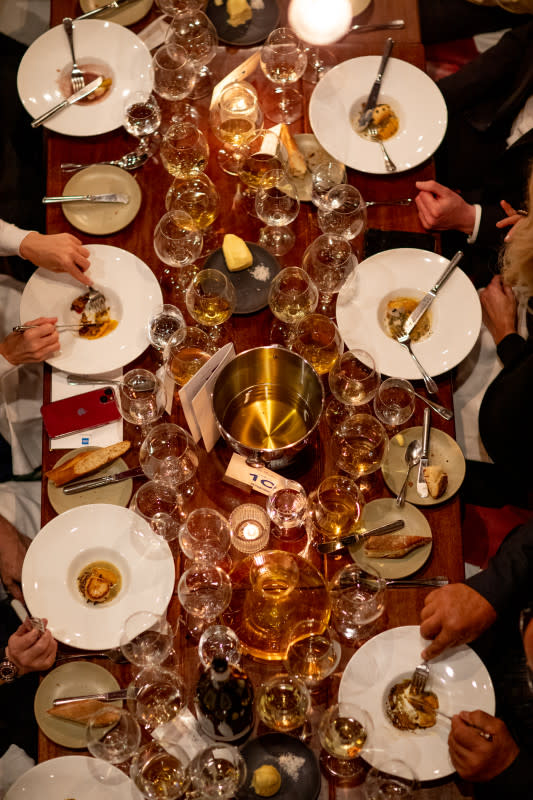 A full table of glassware and elegantly paired food is always in order at La Paulée<p>Courtesy of Pressoir</p>