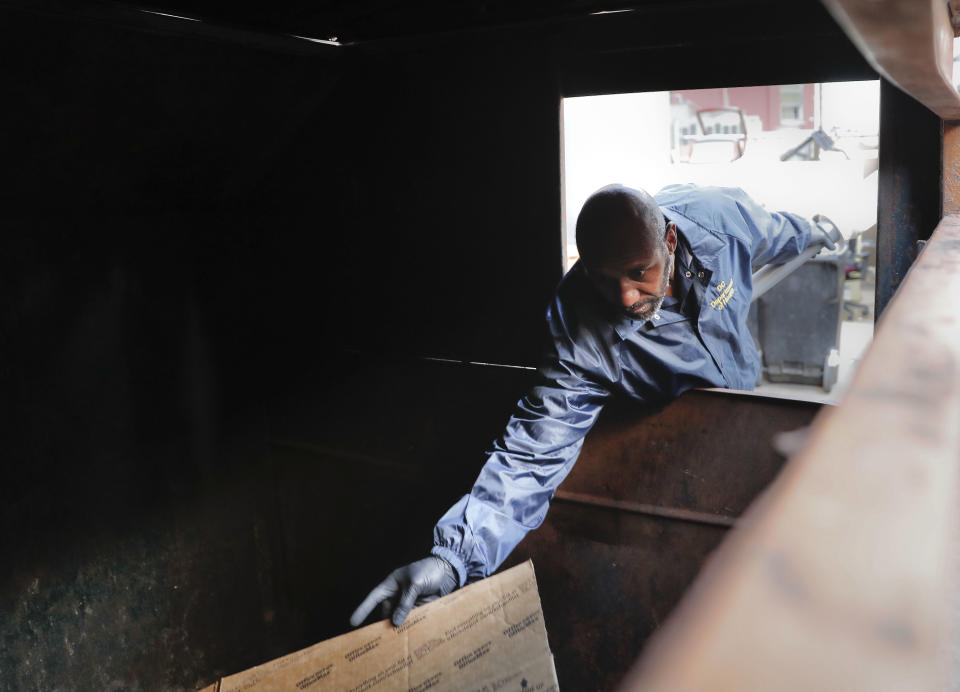 Pest Control Officer Gregory Cornes, from the D.C. Department of Health's Rodent Control Division, inspects a trash dumpster in an alley behind an office building in downtown Washington, Wednesday, Oct. 17, 2019. The nation’s capital is facing a spiraling rat infestation, fueled by mild winters and a human population boom. Washington’s government is struggling to keep pace (AP Photo/Pablo Martinez Monsivais)