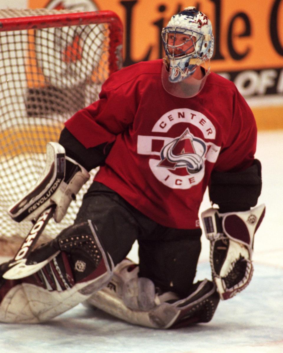 Patrick Roy, goalie for the Colorado Avalanche, makes a save during practice at Joe Louis Arena, May 21, 1997, ahead of Game 4 of the Western Conference finals against the Detroit Red Wings.