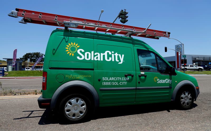 FILE PHOTO: A SolarCity vehicle is seen on the road in San Diego, California