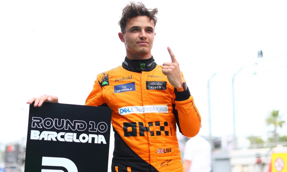 <span>Lando Norris celebrates taking pole position after a competitive qualifying session in Barcelona.</span><span>Photograph: Clive Rose/Formula 1/Getty Images</span>
