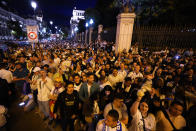 Real Madrid supporters celebrate in Cibeles Square in Madrid after their team clinched the La Liga title, Saturday, May 4, 2024. Real, who had won earlier in the day, clinched the title after Barcelona failed to beat Girona. (AP Photo/Manu Fernandez)