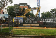 An excavator is parked at the construction site of an apartment block in the suburb of Epping, Sydney, Australia February 1, 2019. Picture taken February 1, 2019. REUTERS/Tom Westbrook