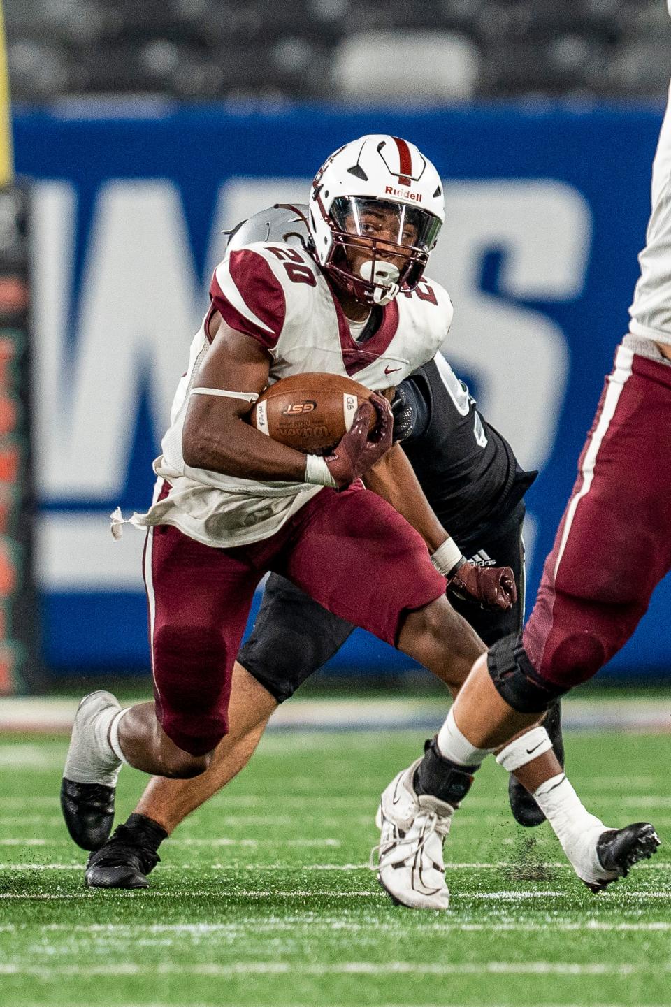 Don Bosco plays St. Peter's Prep in a football game at MetLife Stadium East Rutherford, NJ on Friday September 30, 2022. DB #20 Logan Bush with the ball.