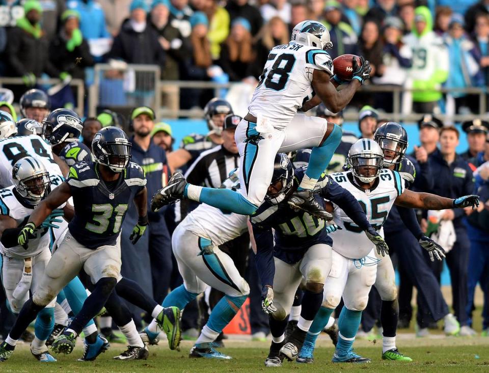 Carolina Panthers linebacker Thomas Davis recovers an onside kick by the Seattle Seahawks during fourth quarter action at Bank of America Stadium in Charlotte, NC on Sunday, January 17, 2016. The Panthers defeated the Seattle Seahawks in a NFC Divisional game 31-24. Jeff Siner/jsiner@charlotteobserver.com